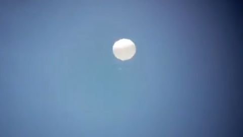 A picture taken from a video shows an airborne object flying above Colombia. CNN is unable to confirm if the images show a Chinese surveillance balloon. 