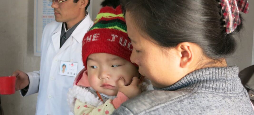 Children wait to receive nutritional supplements at a clinic in Nampo City, Democratic People's Republic of Korea. (file)