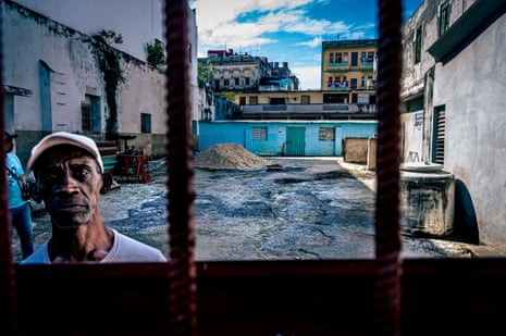A guard at the entrance of the Rastro from Old Havana, a warehouse that sells construction materials