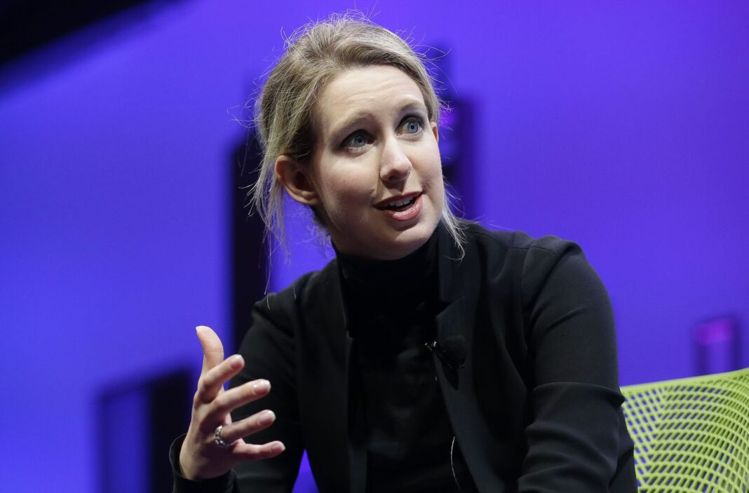 As Elizabeth Holmes heads to prison for fraud, many puzzle over Theranos founder's motives