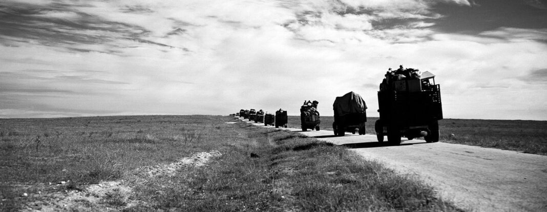 A convoy of trucks carries refugees and their belongings from Gaza to Hebron in the West Bank.