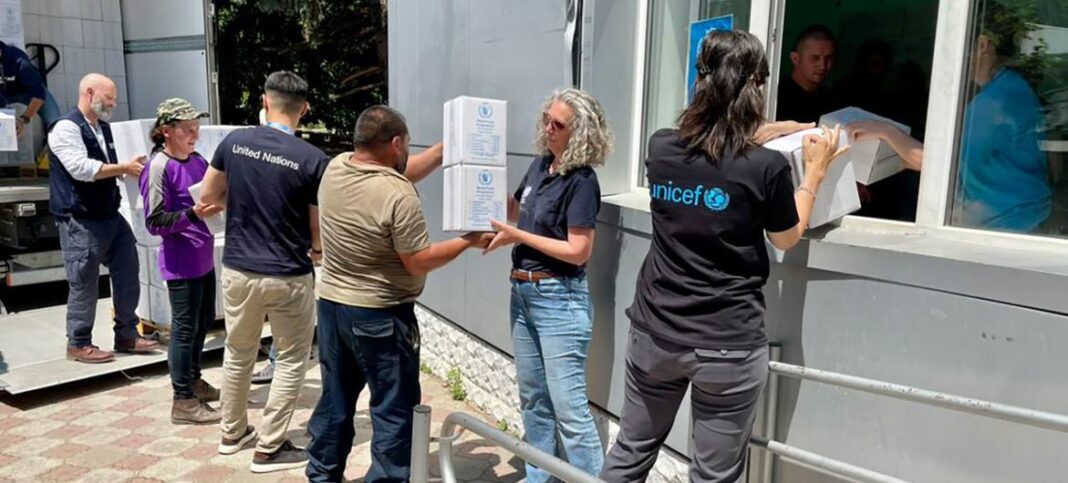 Denise Brown, UN Resident and Humanitarian Coordinator in Ukraine  (second right), visits Bilozerka, one of the communities worst-affected by the floods caused by the Kakhovka Dam.