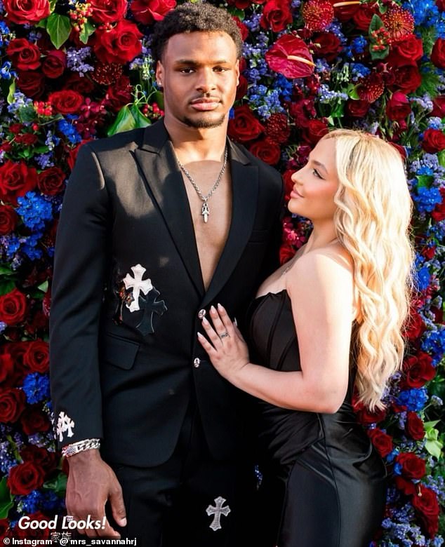 LeBron James 's son, Bronny, has suffered a cardiac arrest during a basketball workout. Pictured: The 18-year-old posed with his rumored girlfriend Peyton Gelfuso, 19, in May