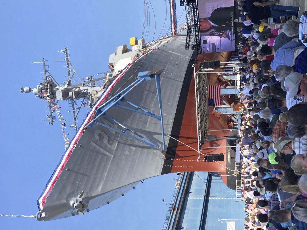 Medal of Honor recipient watches as warship bearing his name is christened in Maine