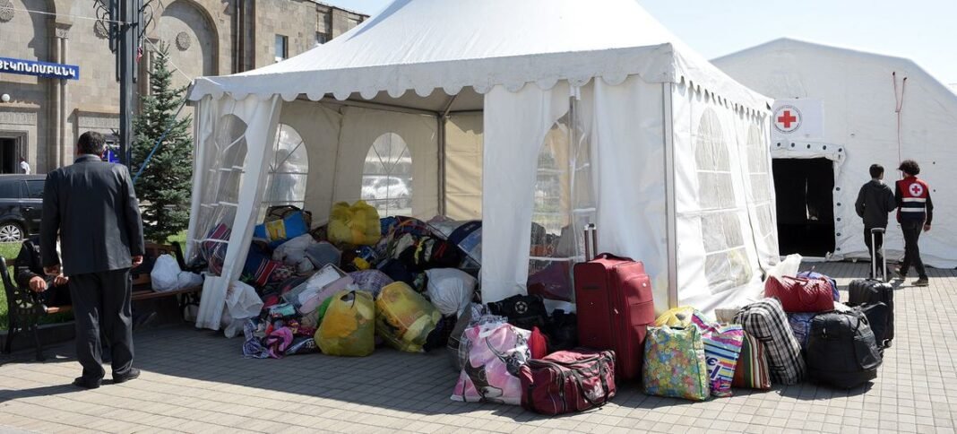 Refugees leave their possessions in a  tent in Goris, Armenia.