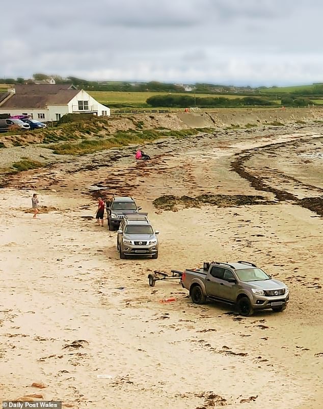 In Anglesey, locals blasted tourists for treating a secluded beach as a car park as three 4x4s parked up and had a BBQ - leaving their rubbish behind at the beauty spot afterwards