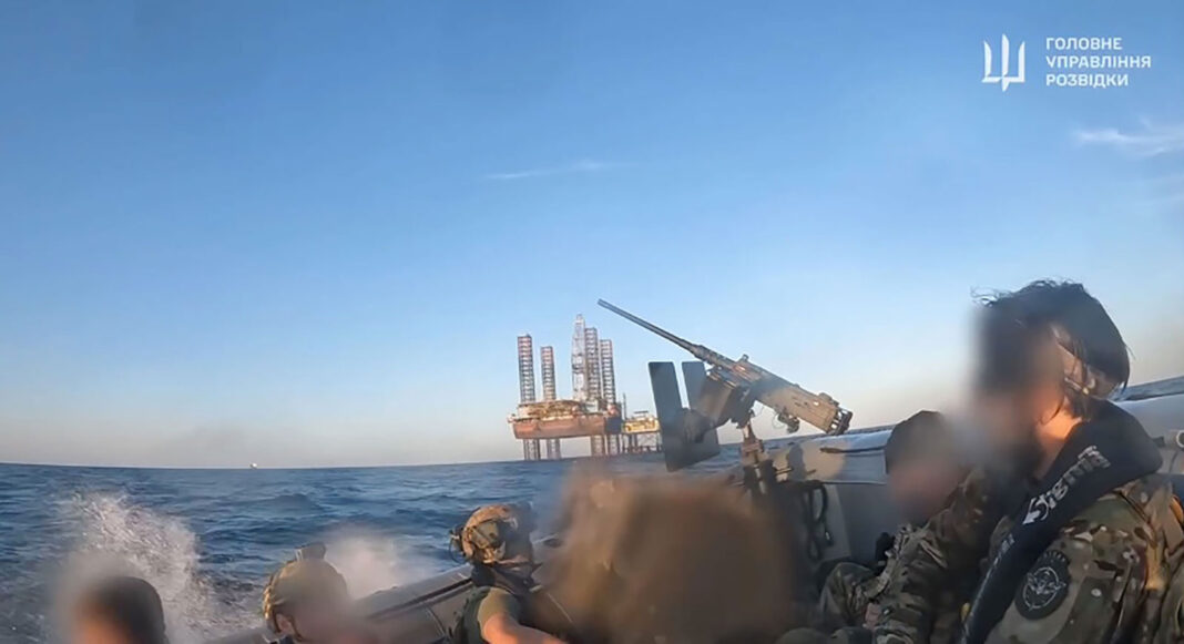 A screengrab from a video released by the Ukraine Defense Intelligence shows Ukrainian special forces during an operation to take control of Bokyo Towers off the northwest coast of Crimea. Portions of this image have been blurred by the Ukraine Defense Intelligence. 