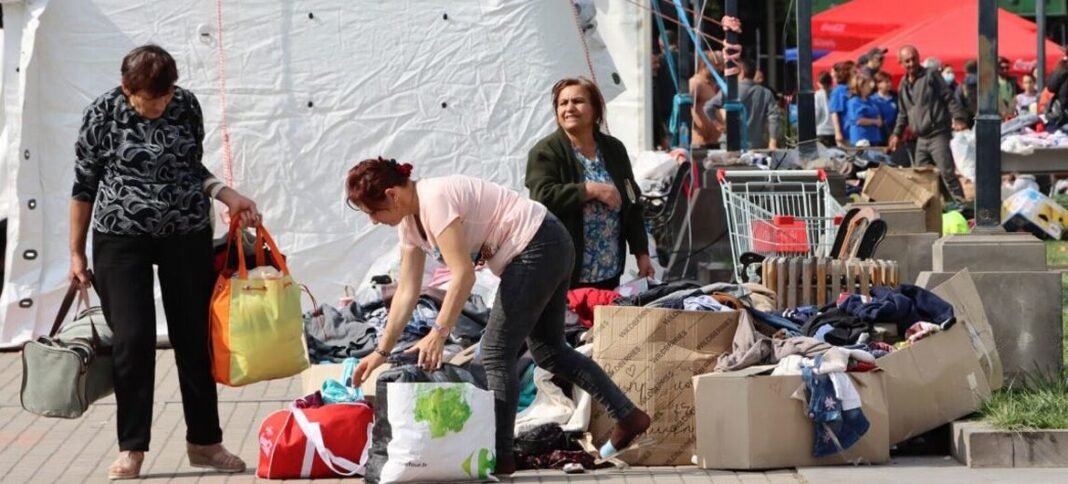 People fleeing Karabakh rest and receive humanitarian aid in Goris, Armenia, close to the border.