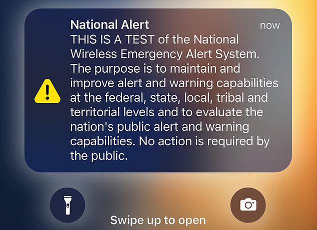 Did YOU get the alert? Millions of US smartphones hit with blaring warning during nationwide emergency drill - as conspiracy theorist claimed the test would spark a zombie apocalypse