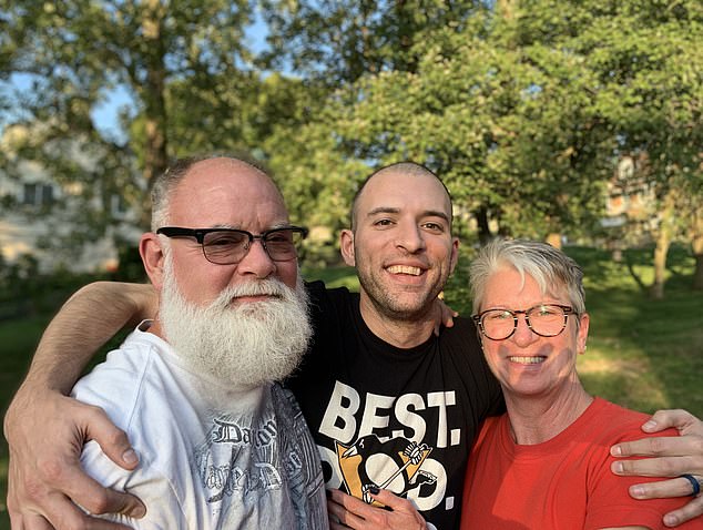 Jordan (center) with his parents. He died from colon cancer age 31, leaving behind a wife and son