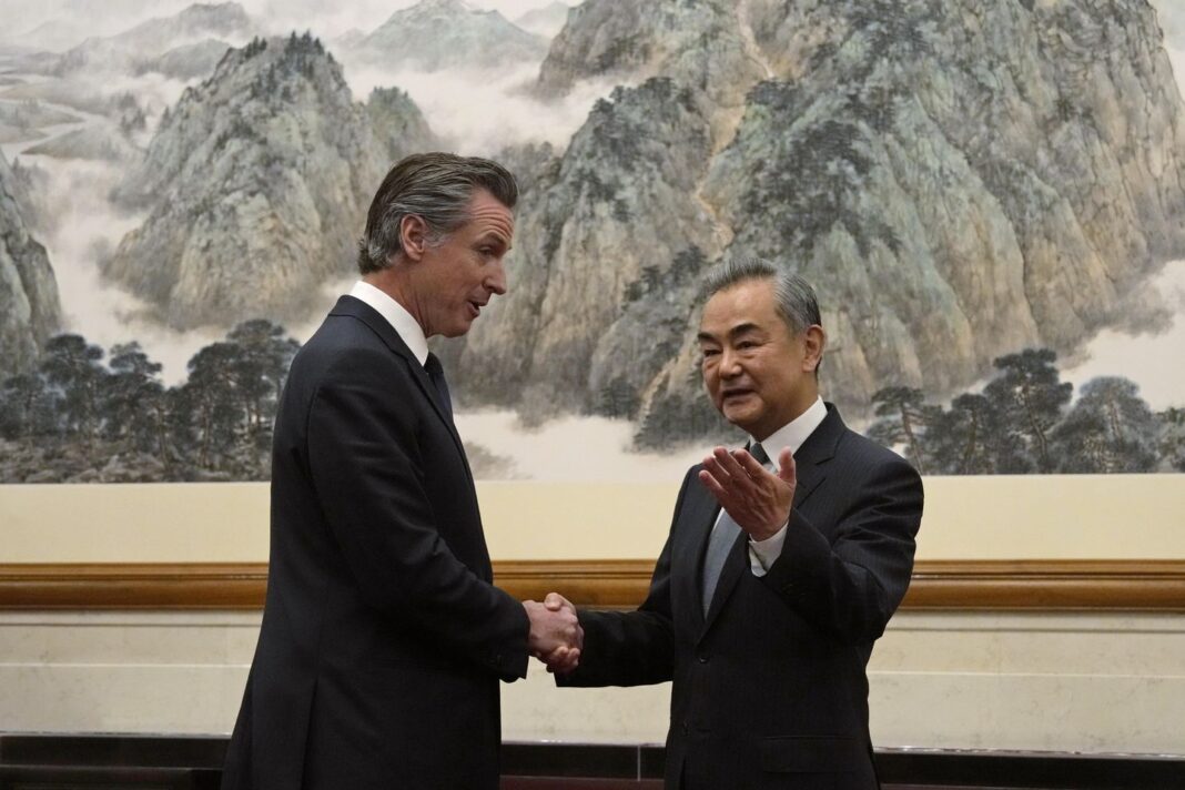 Gavin Newsom has rare friendly exchange with China's senior diplomat Wang Yi