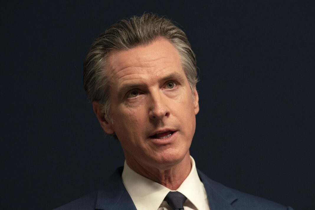 Gavin Newsom signs law to slowly raise health care workers' minimum wage to $25 per hour