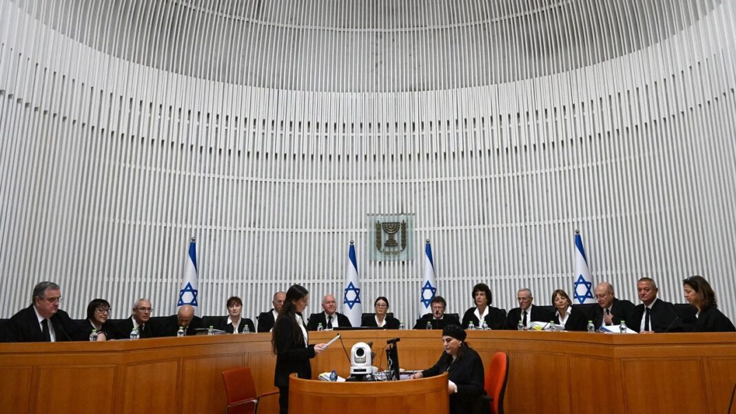 All 15 judges of the Israeli Supreme Court assembled for the start of hearings on Tuesday.