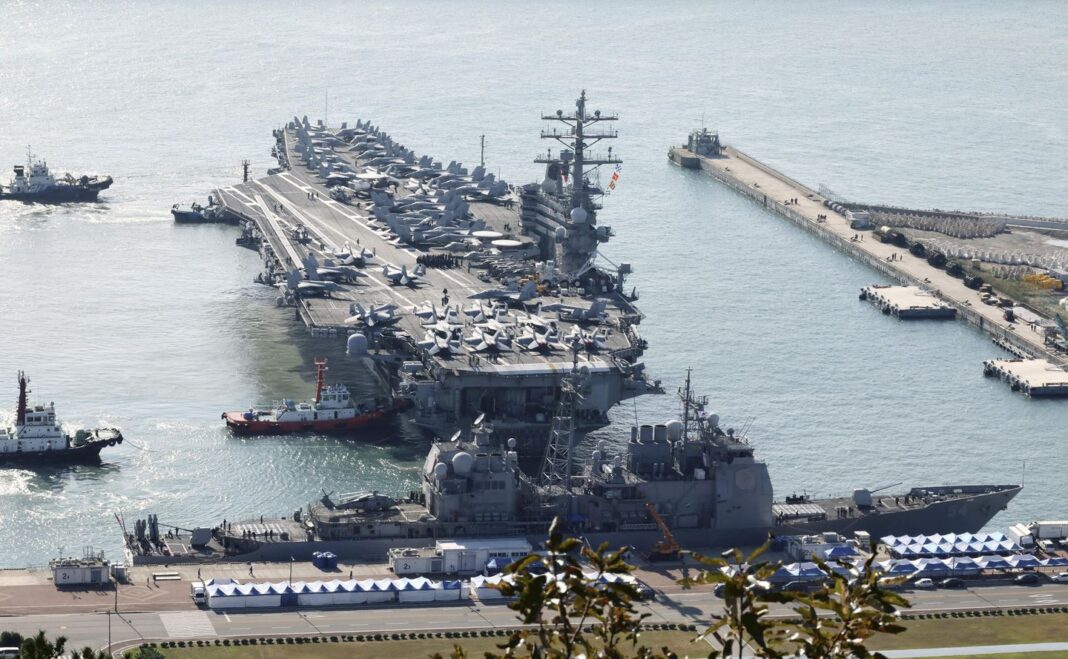 U.S. aircraft carrier arrives in South Korea as Kim Jong-un exchanges messages with Vladimir Putin