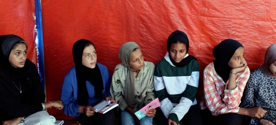 Students in Deir Al-Balah, in central Gaza, participate in an interactive dialogue on human rights under international law.