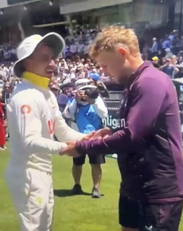 Joe Root appeared to cheekily joke that Marnus Labuschagne had smeared super glue on his hand, as he and the Australian shared a lighthearted moment on Sunday in Adelaide